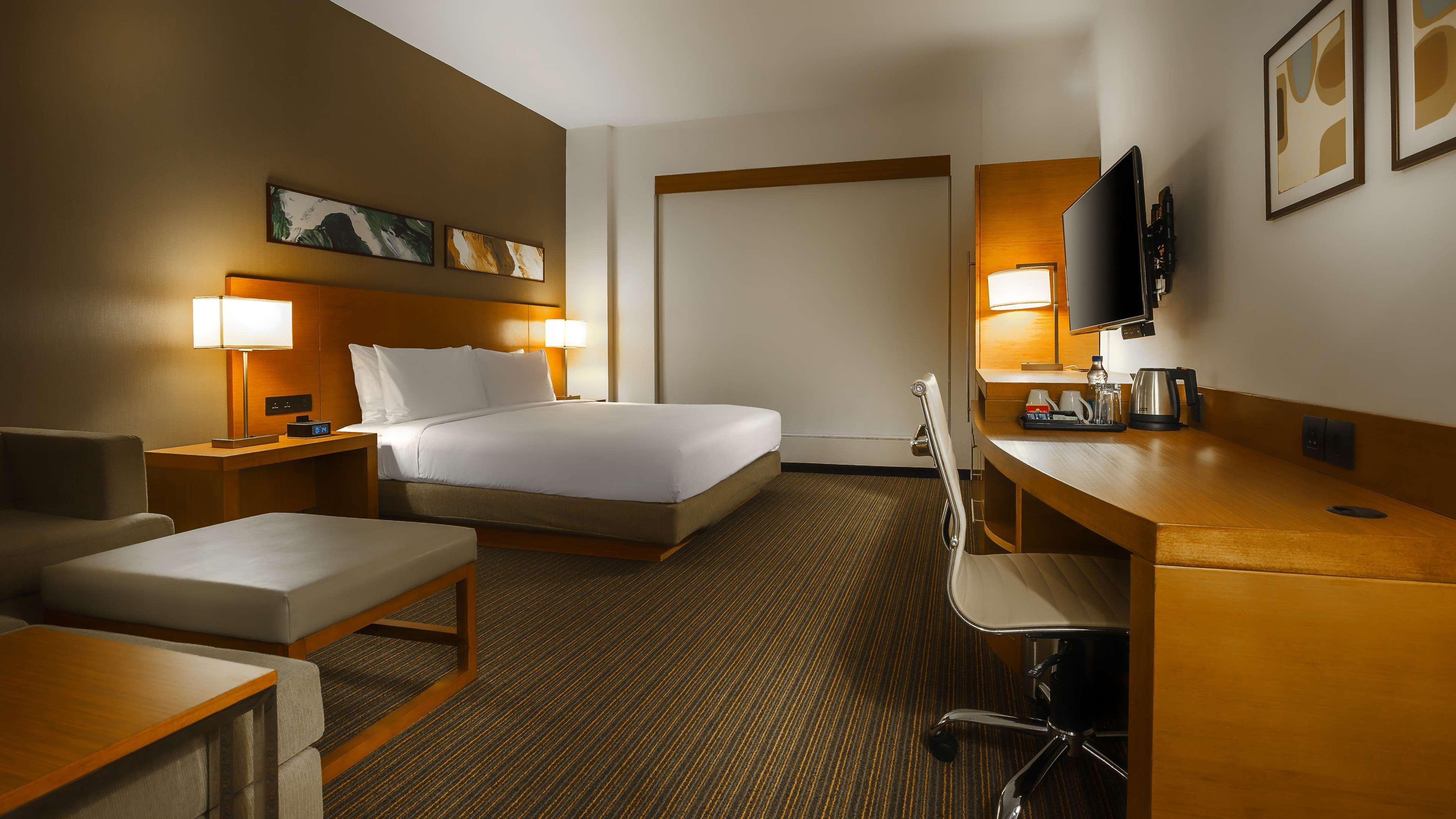 Hyatt Place Gurgaon Udyog Vihar Exterior foto A typical room at the Holiday Inn Express